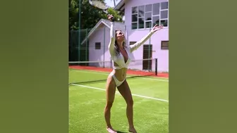 Swim Models Getting Active Playing Tennis