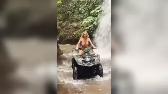 HANNAH PALMER rides an ATV through a waterfall in Bali #shorts